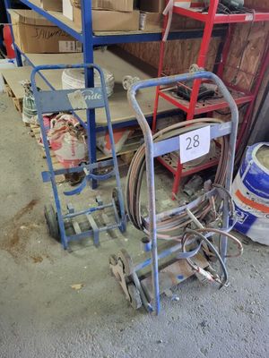 a cart with a number on it next to a pile of boxes