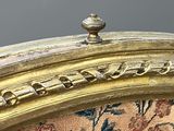 an image of a close up of a chair with a floral pattern on it