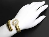 a close up of a person ' s hand with a watch on it