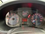 a close up of a car dashboard with a speedometer