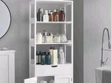 a picture of a bathroom with a white cabinet in it
