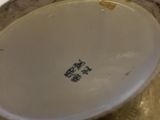 a close up of a bowl on a table