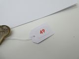 une étiquette sur laquelle est inscrit « pa », à côté d'un bout de papier