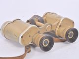 a pair of binoculars that are sitting on a table