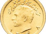 an image of a close up of a gold coin with a man ' s face