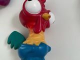 toy figurines of a rooster with a red head and a blue tail