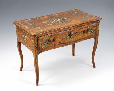 an old wooden table with a drawer on top of it