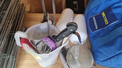 a blue bag and a blue bag on a wooden table