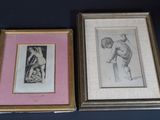 two framed drawings of a man and a woman on a blue background
