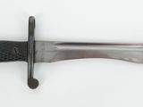 a knife that is laying on top of a table