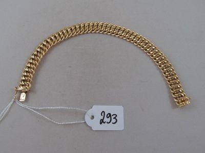 an image of a gold chain bracelet with a price tag on it
