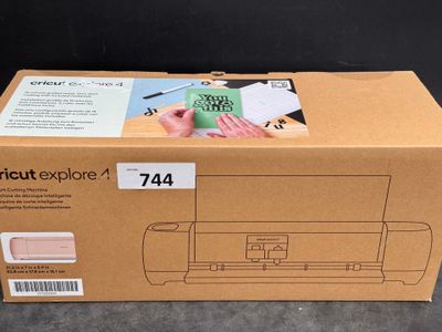 une boîte sur laquelle figure l'image d'une imprimante