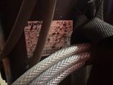 a close up of a hose connected to a water heater