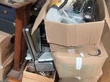 many boxes of assorted items in a garage