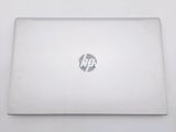 hp laptop computer sitting on a white surface with a white background