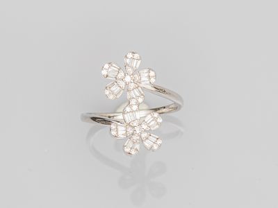 a diamond cluster ring, by van cleef