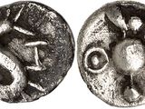 a close up of a coin with a man on it