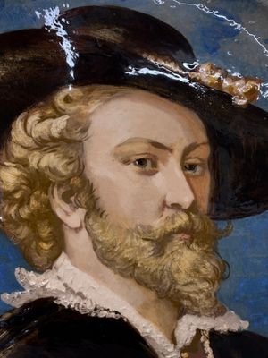 portrait d'un homme portant un chapeau noir et un col blanc