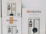 four boxes of brabantia coffee makers sitting on top of a table