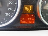 a close up of a car dashboard with various gauges and numbers