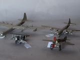 four toy airplanes that are sitting on a table