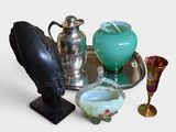 many different vases and vases on a tray