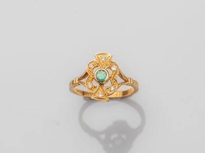 an emerald and diamond ring