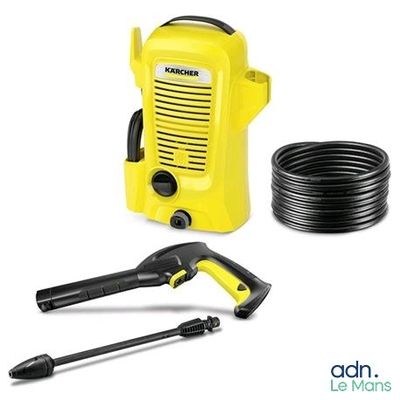 un manomètre jaune et un tuyau à côté d'un autre tuyau, sur fond blanc