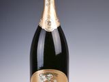 a bottle of champagne that is sitting on a table