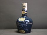 a bottle of liquor that is sitting on a table