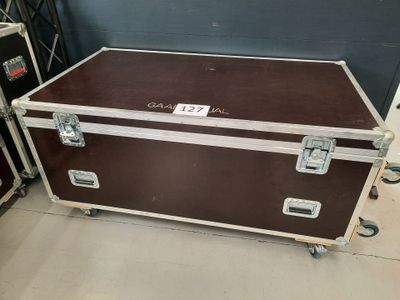 a trunk that is sitting in the middle of a room