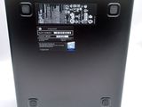 the back of a laptop with a battery on top of it