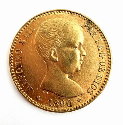 une image représentant une pièce d'or sur laquelle figure le portrait d'un enfant