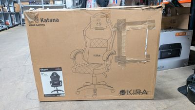a cardboard box with a drawing of a person sitting on a chair