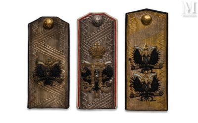 three different types of metal plaques on a white background