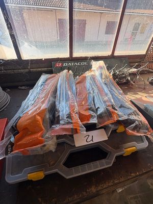 a box of tools sitting on a table in front of a window