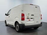 a white van that is parked in a room
