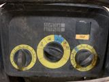 a close up of a black and yellow control panel