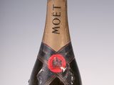 an old bottle of champagne with a label on it