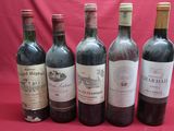 six bottles of wine are lined up in a row on a red background