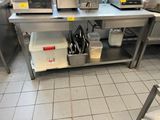 two microwaves on the counter in the kitchen