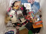 a pile of clothes and other items in a plastic bag