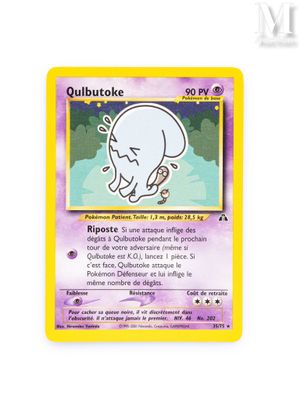 a close up of a pokemon card on a white surface