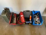 a lot of tools that are sitting in a blue box
