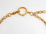 an image of a close up of a chain on a white surface
