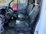 an image of the inside of a van with the driver ' s seat up