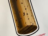 a poster with a picture of a wooden object on it