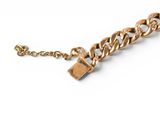 an image of a gold chain bracelet with a padlock on it