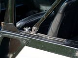 a close up of a car door handle with a small bird on it