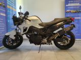 a motorcycle that is parked in a showroom